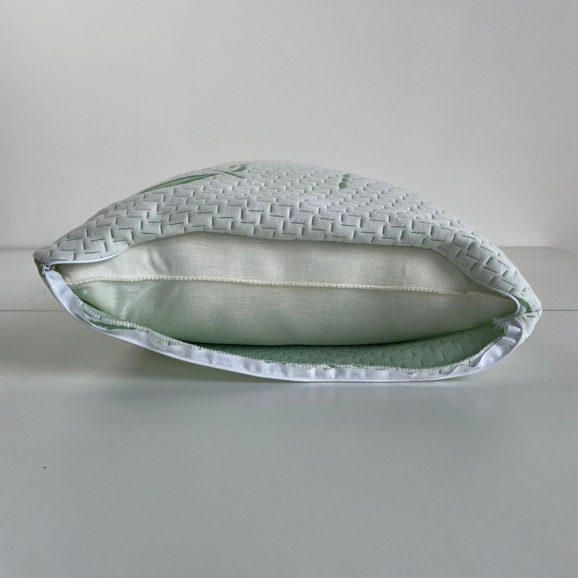 Bamboo fiber memory pillow manufacturer customizes crushed sponge memory pillows and slow-rebound sponge pillows for export Item Picture