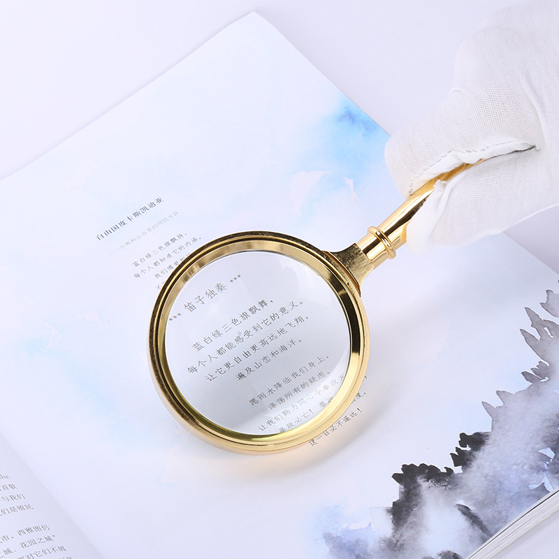 Wholesale of fashionable new metal ring gold-plated simple straight handle magnifying glass, personalized handheld reading glass for the elderly Item Picture