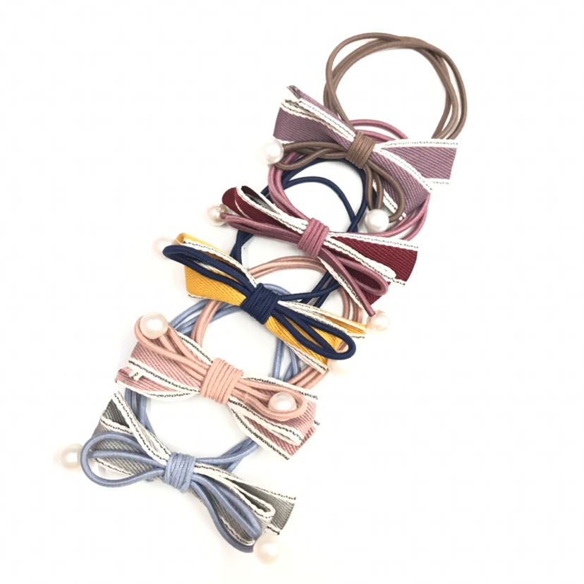 The new Korean version of the color thread with pearl bow tie hair ring hair rope head ring rubber band red ING popular thumbnail