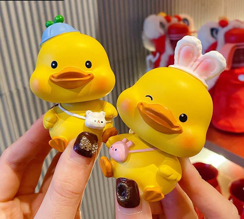 New original duckling shaking head car decoration, cute plush toy, creative home desktop decoration, as a gift for friends details Picture