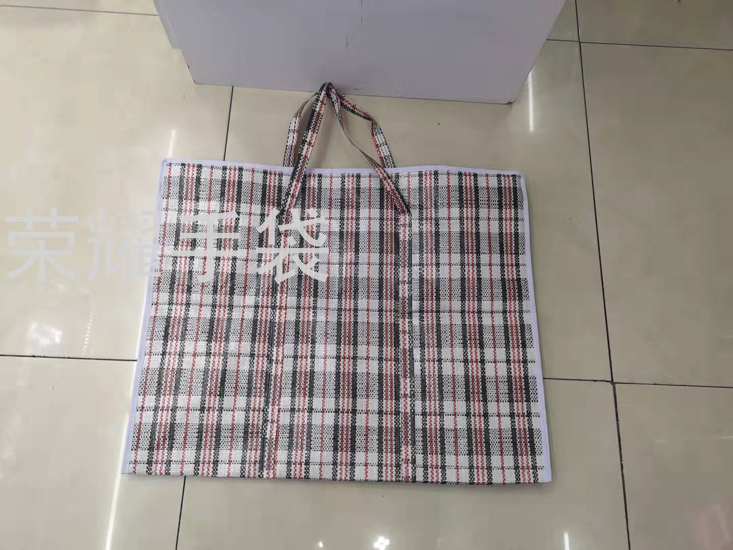 Factory direct sales of grid woven bags, luggage bags, home bags, storage bags, pp material three-color snake skin bags, extra-large bags