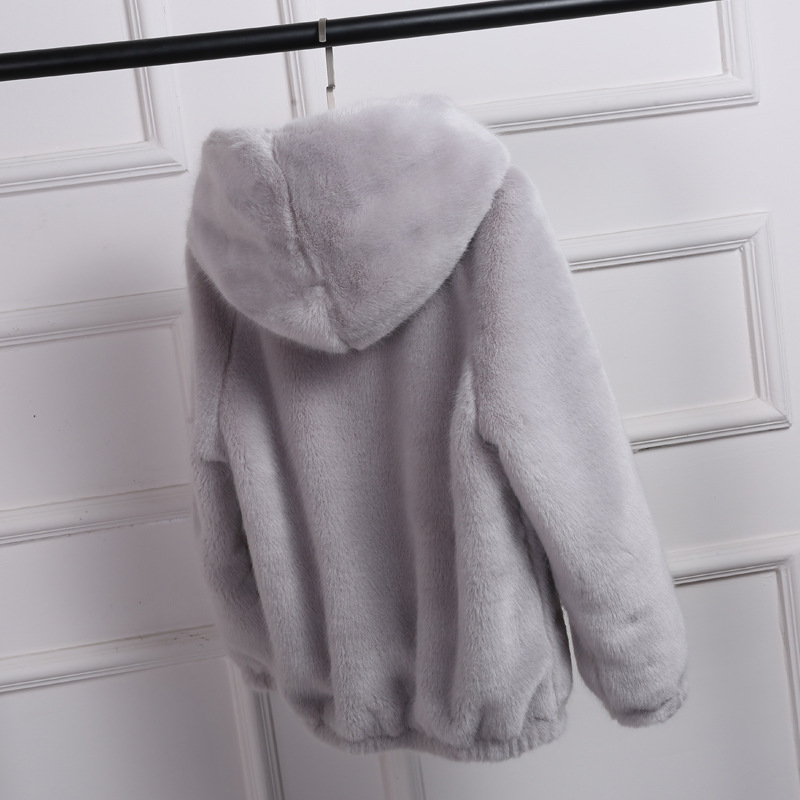 The 2021 autumn/winter new style of faux fur coat for women in Korean style is loose, cute and short. It is made of rex rabbit fur and fleece with a hooded hat details Picture