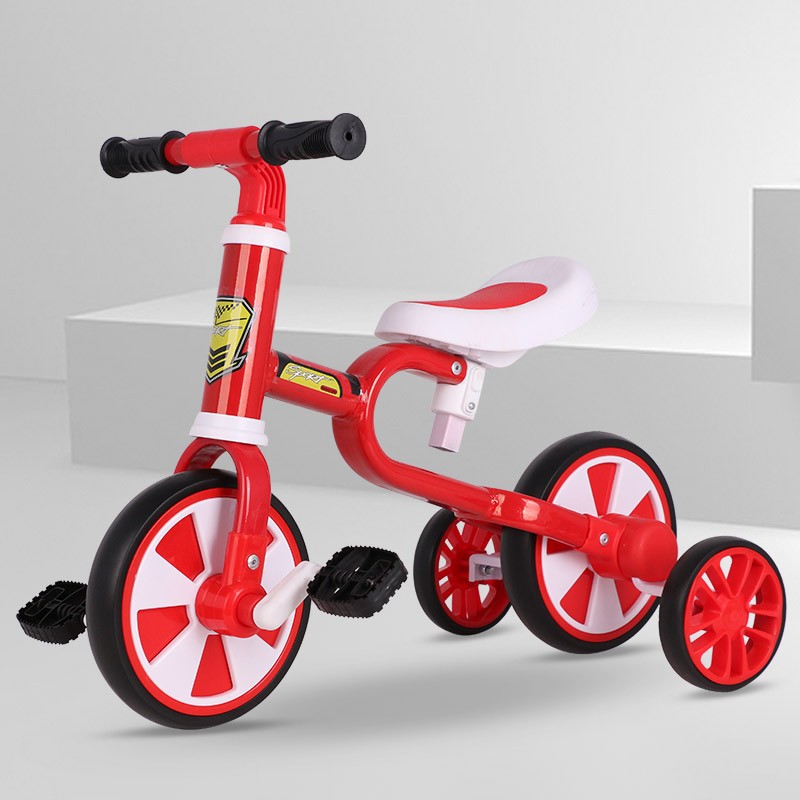 Children's multi-functional tricycle, balance bike and roller coaster - one vehicle with multiple uses full figure