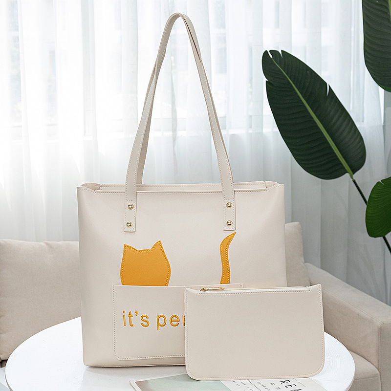 Guangzhou Foreign Trade Women's Bag 2021 Summer Korean version rivet hand-held simple large-capacity printed mother-to-child tote bag trend