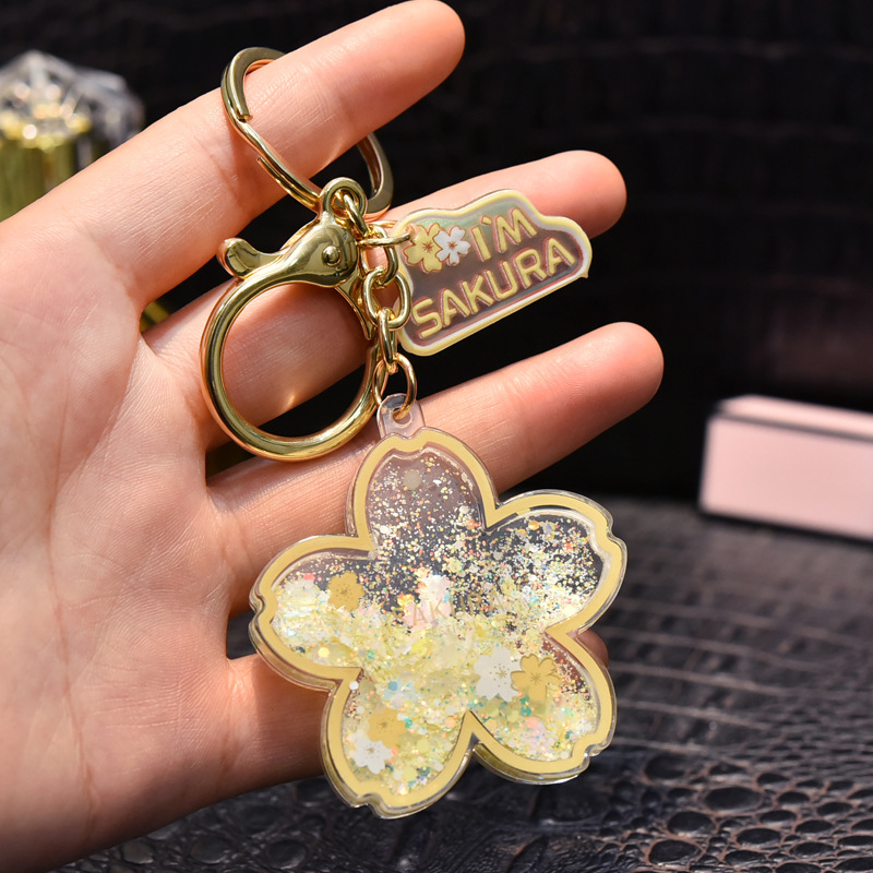 Acrylic sand oil cherry blossom keychains, pendants, gifts, couple backpacks, floating key chains, small gifts wholesale Specification image