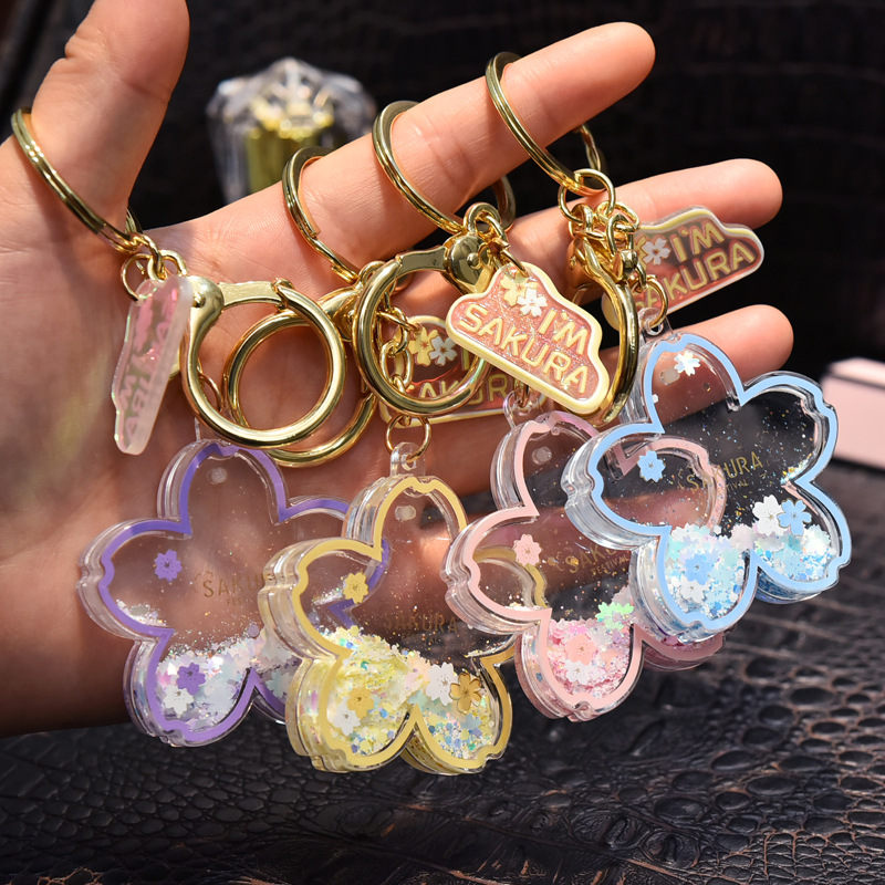 Acrylic sand oil cherry blossom keychains, pendants, gifts, couple backpacks, floating key chains, small gifts wholesale
