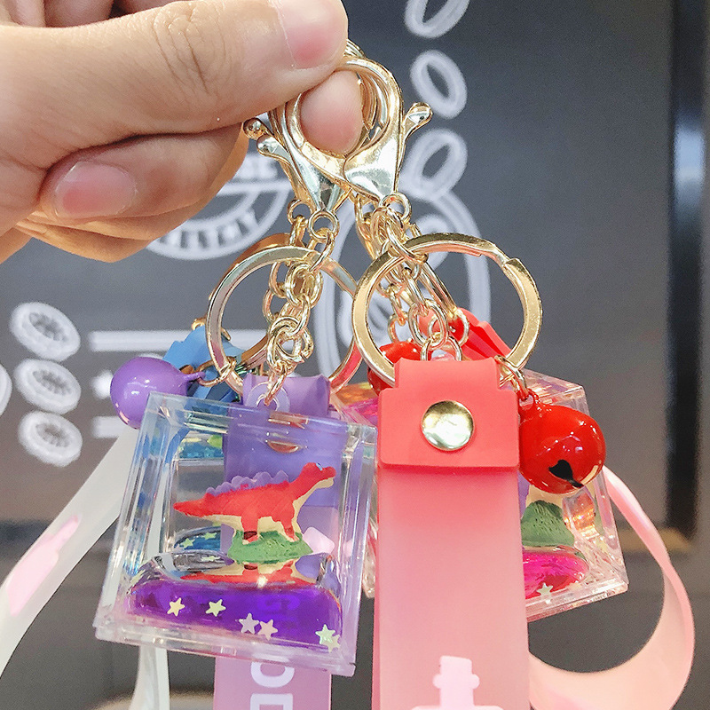 Cute Quicksand dinosaur world keychain cartoon liquid crystal floating bottle car bag pendant gift wholesale