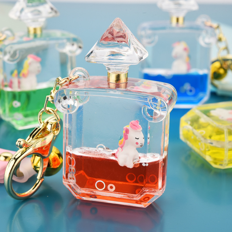 Wholesale of new summer girls' schoolbag accessories featuring acrylic unicorn oil perfume bottles, keychains and jelly leather ropes details Picture