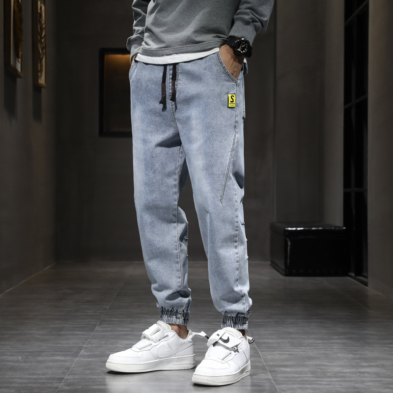 The new autumn stretch jeans for men, stylish and casual trousers, and the trendy brand Weiha loose nine-inch tapered men's pants details Picture