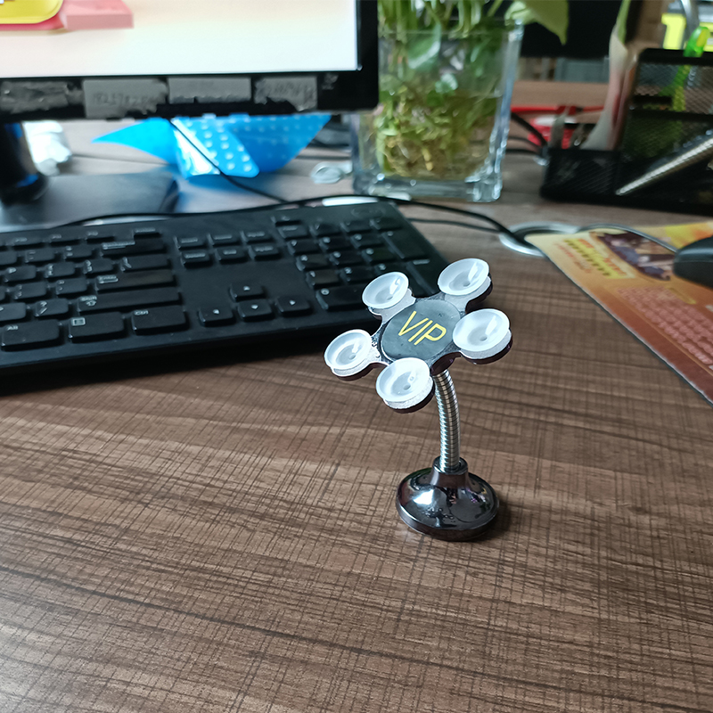 地摊夜市货源新款魔力吸盘手机支架车载居家手机支架义乌厂家批发