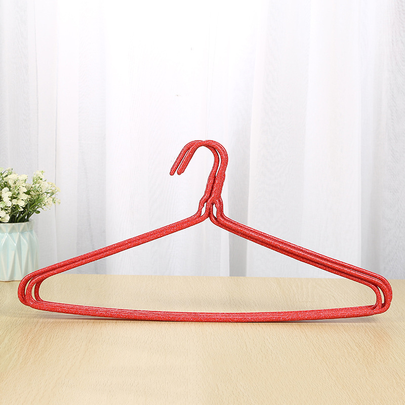 Wholesale household metal plastic-coated seamless hangers, simple and patterned adult hangers, men's and women's shirt drying racks Application Scenario