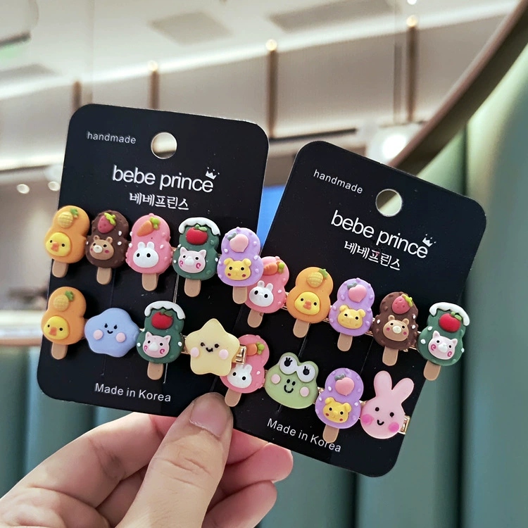 The factory store's wholesale of new hair accessories, cartoon ice cream, candy, colored side clips, bangs clips, and hair clip accessories are selling well at the street stall Application Scenario
