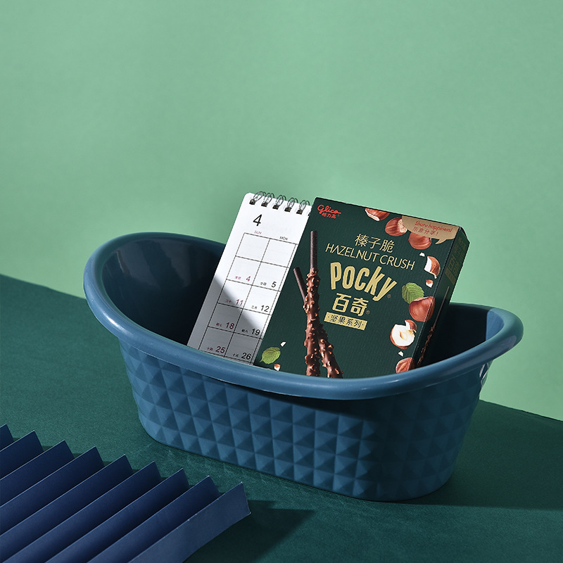 Wholesale of simple and creative plastic storage baskets, fashionable desktop cosmetics organization and storage baskets, and snack storage baskets Specification image