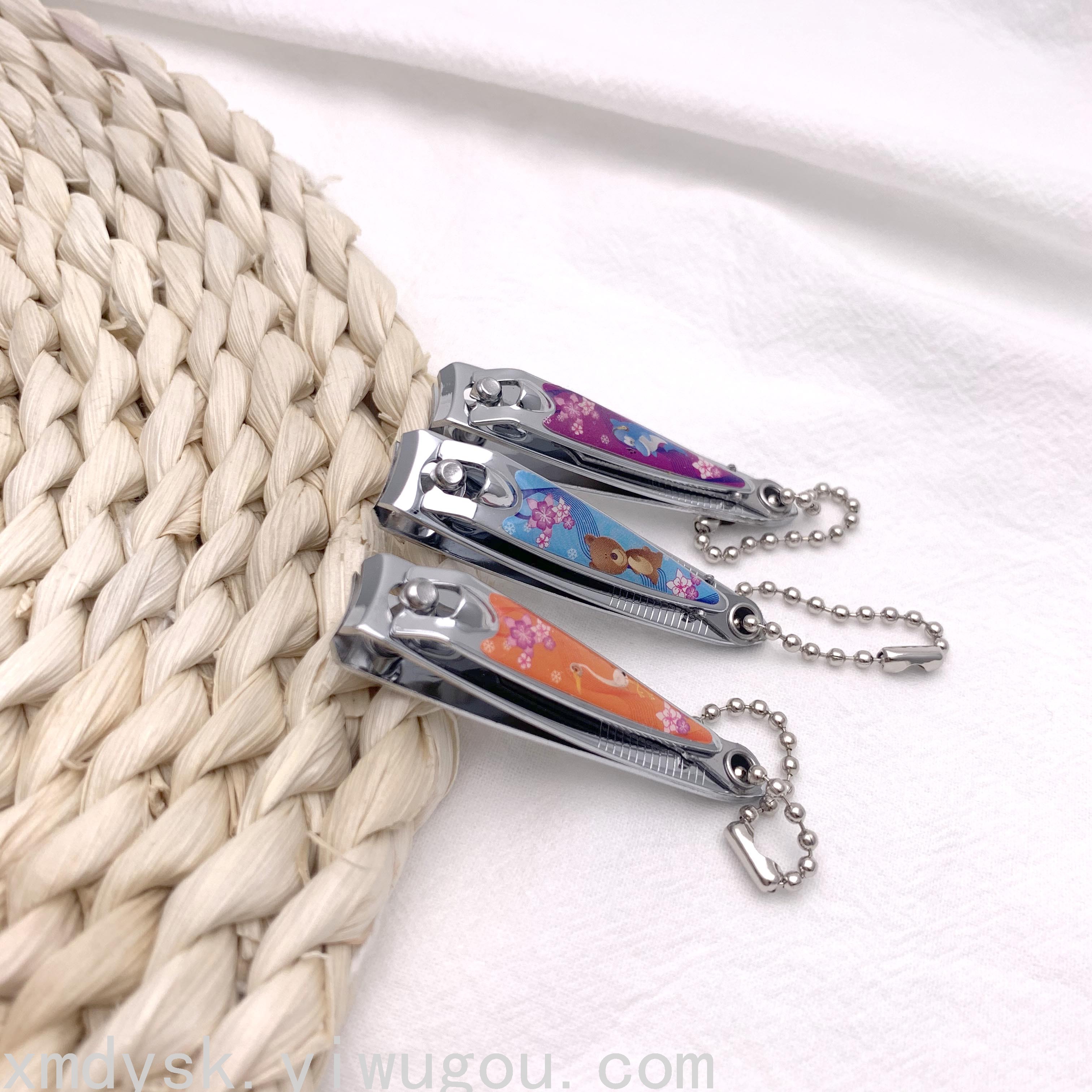 Xinmeida small nail clippers with files, key chains, cute cartoon nail clippers, wholesale nail trimming knives Application Scenario
