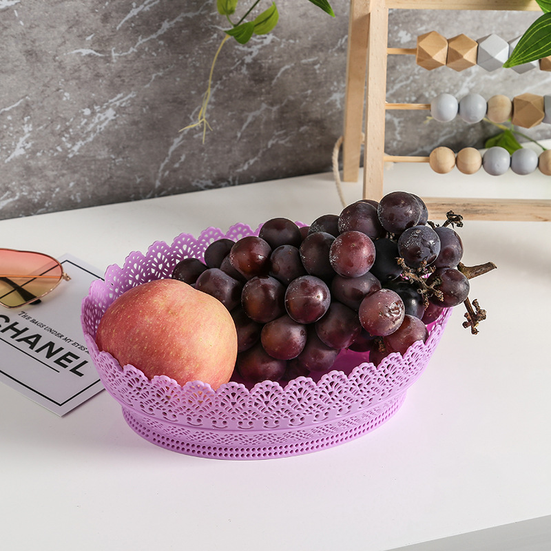 Factory direct sales creative home living room snack and dried fruit plate, large capacity round tray, plastic hollowed-out fruit plate Specification image