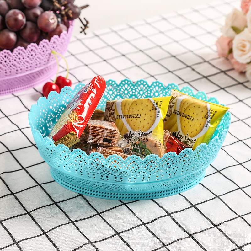 Factory direct sales creative home living room snack and dried fruit plate, large capacity round tray, plastic hollowed-out fruit plate Application Scenario