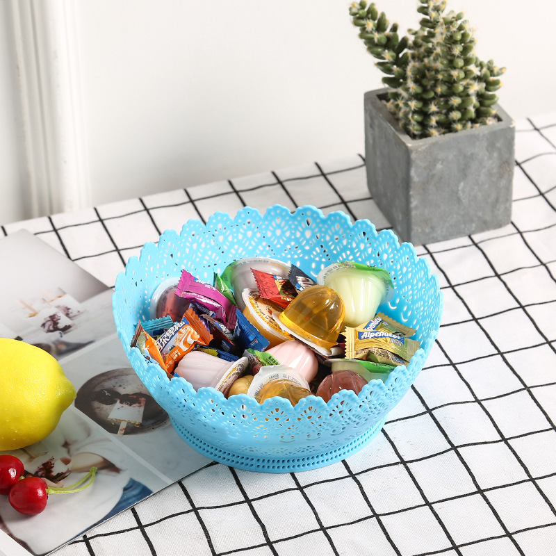 Factory direct sales creative home living room snack and dried fruit plate, large capacity round tray, plastic hollowed-out fruit plate details Picture