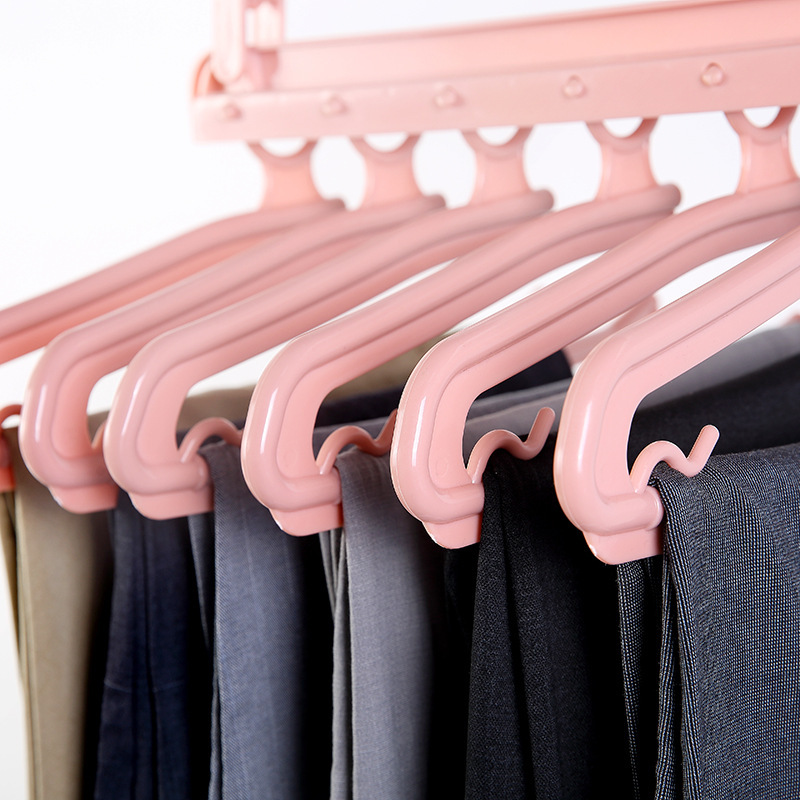 Folding multi-functional multi-layer trouser rack, trouser hanger, home magic trouser clip, wardrobe storage trouser hanging rack Application Scenario