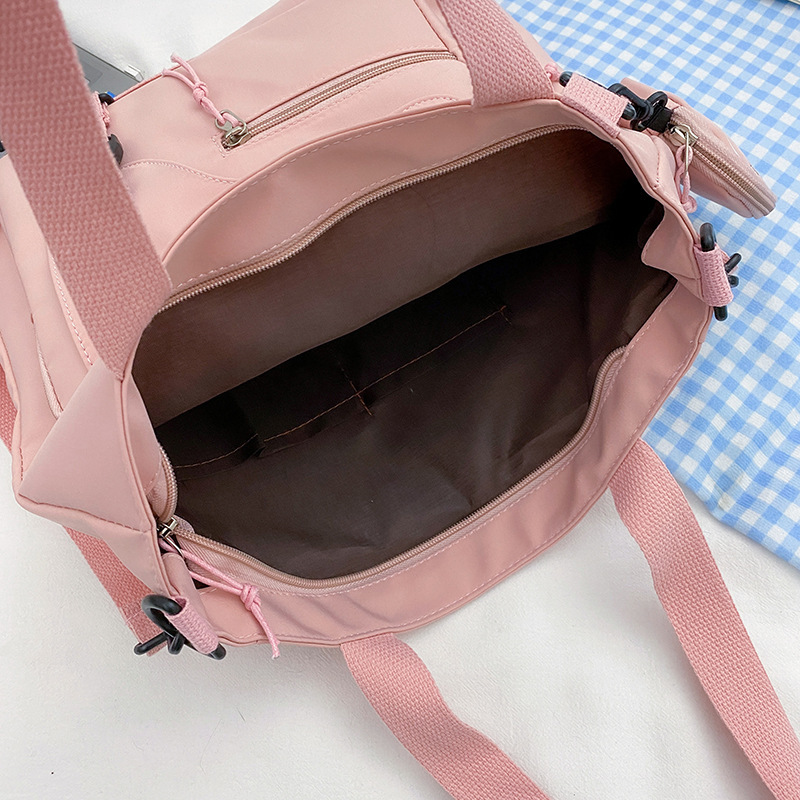 2021 New large-capacity canvas bag for Japanese female students, single-shoulder bag for class, sweet Instagram campus crossbody bag Application Scenario