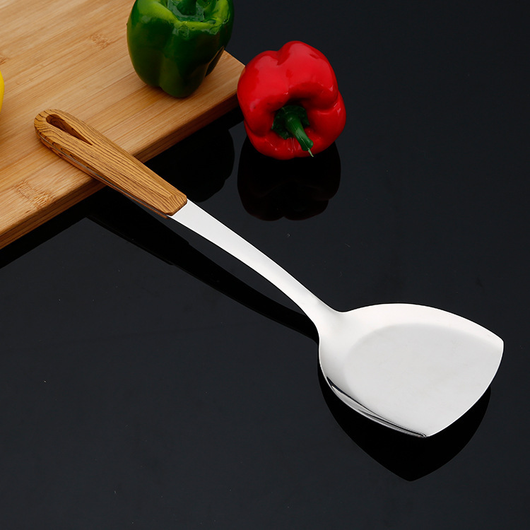 Two-piece set of stainless steel 3-centimeter-thick wood-grain handle cooking spatula and colander Specification image