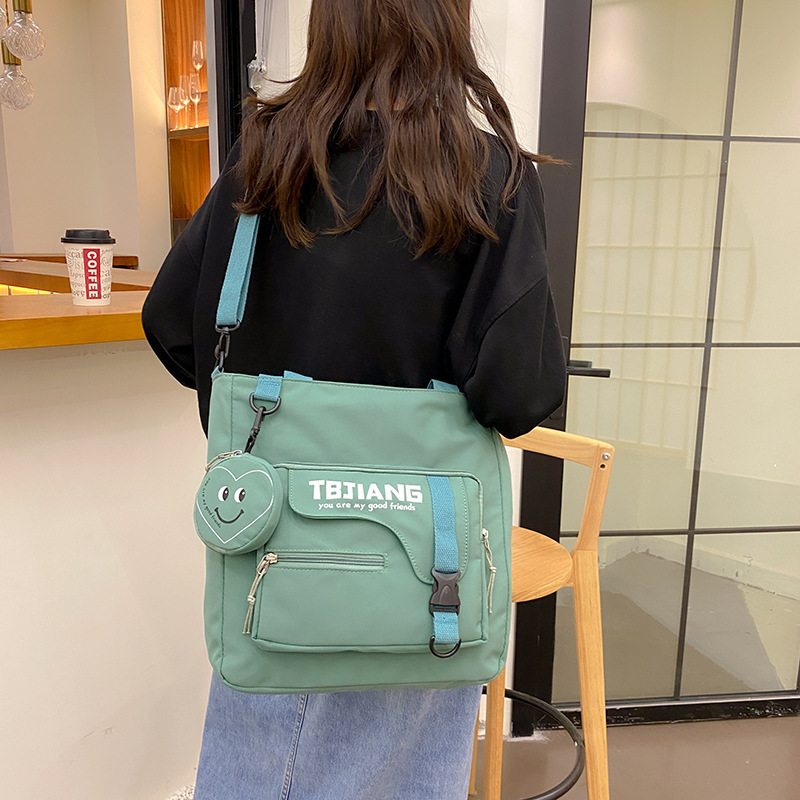2021 New large-capacity canvas bag for Japanese female students, single-shoulder bag for class, sweet Instagram campus crossbody bag Specification image