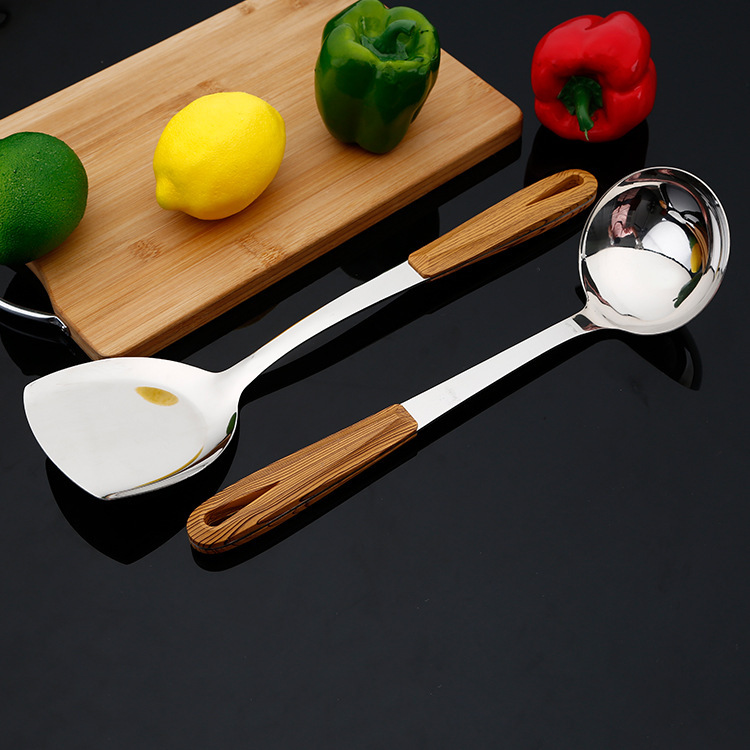Two-piece set of stainless steel 3-centimeter-thick wood-grain handle cooking spatula and colander details Picture