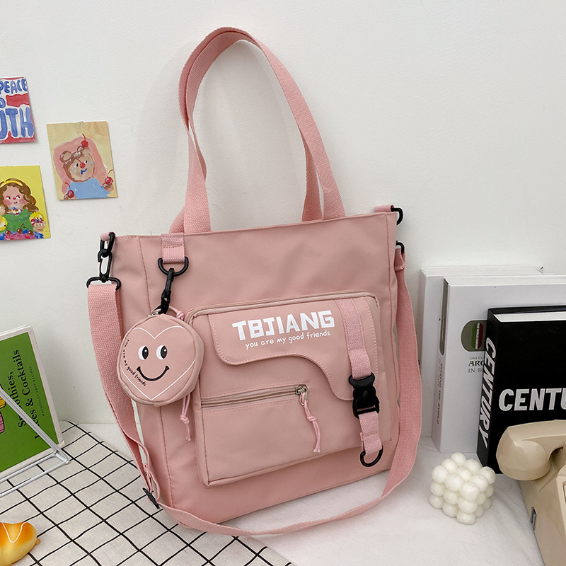 2021 New large-capacity canvas bag for Japanese female students, single-shoulder bag for class, sweet Instagram campus crossbody bag details Picture