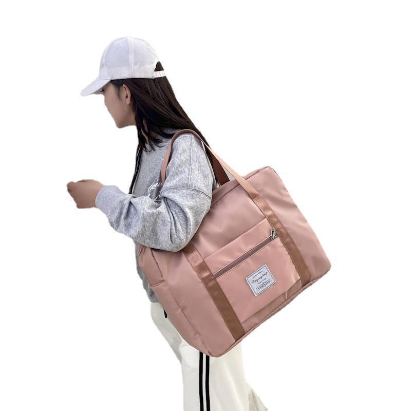 Bolsa de almacenamiento de mano de viaje de gran capacidad para las mujeres pequeña bolsa de estudiante ligera puede ser cubierta con caja de barra de estiramiento bolsa de viaje de corta distancia details Picture