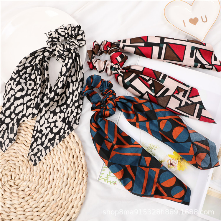 Wholesale of new cross-border European and American creative geometric pattern hair bands, large intestine bands, fashionable big bows and elastic ponytail Specification drawing