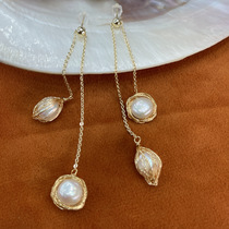 Asymmetrical pearl earrings