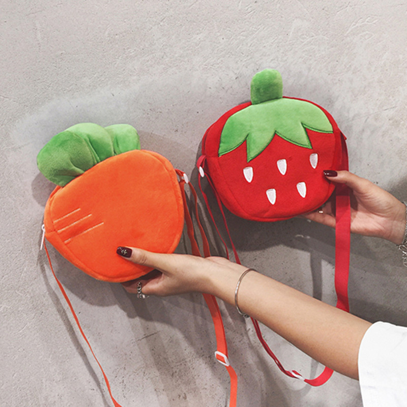Wholesale 2020 women's new style canvas bags, cute cartoon strawberry single-shoulder crossbody bags, fun dolls, coin purges