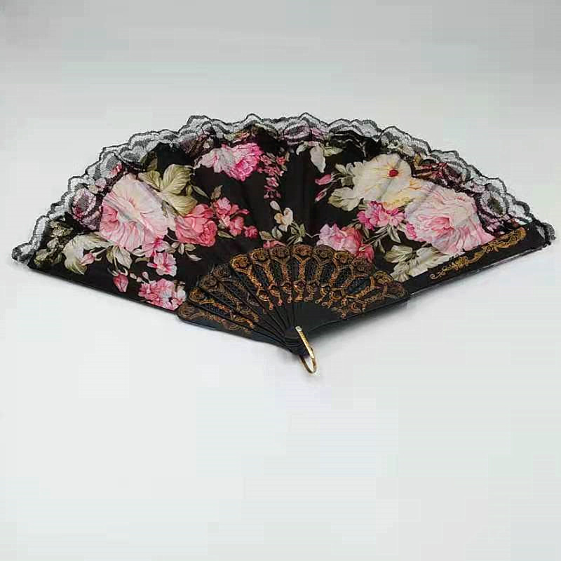 This trendy and fashionable lady fan is convenient to carry. It is made of lace printed silk fabric and is a high-end folding fan for dancing