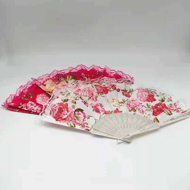 This trendy and fashionable lady fan is convenient to carry. It is made of lace printed silk fabric and is a high-end folding fan for dancing Application Scenario