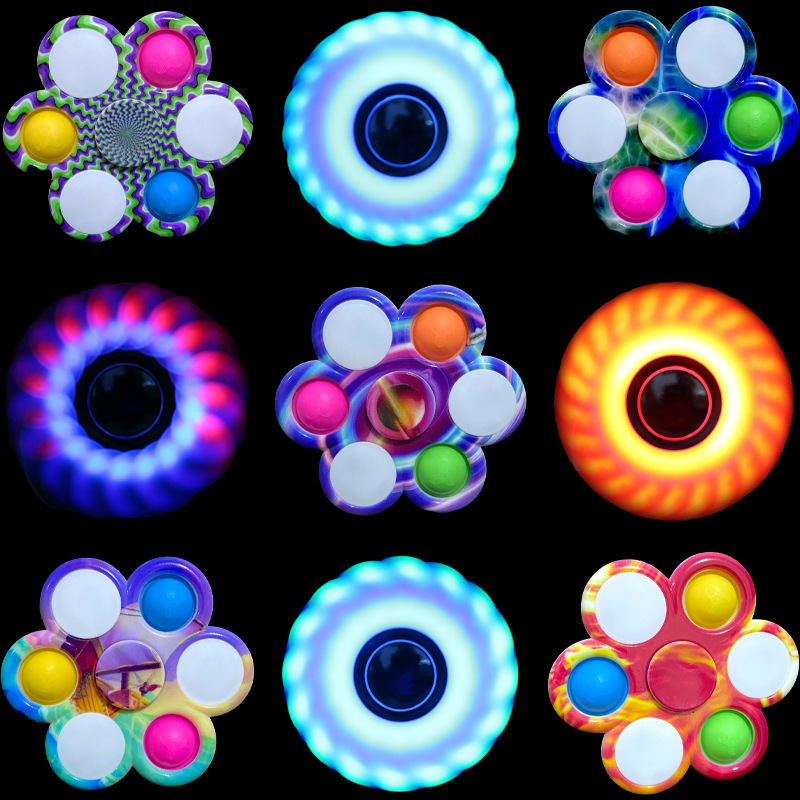New fingertip spinner pressing rotary bubble pinching joy five - six leaf printed children's luminous toys wholesale