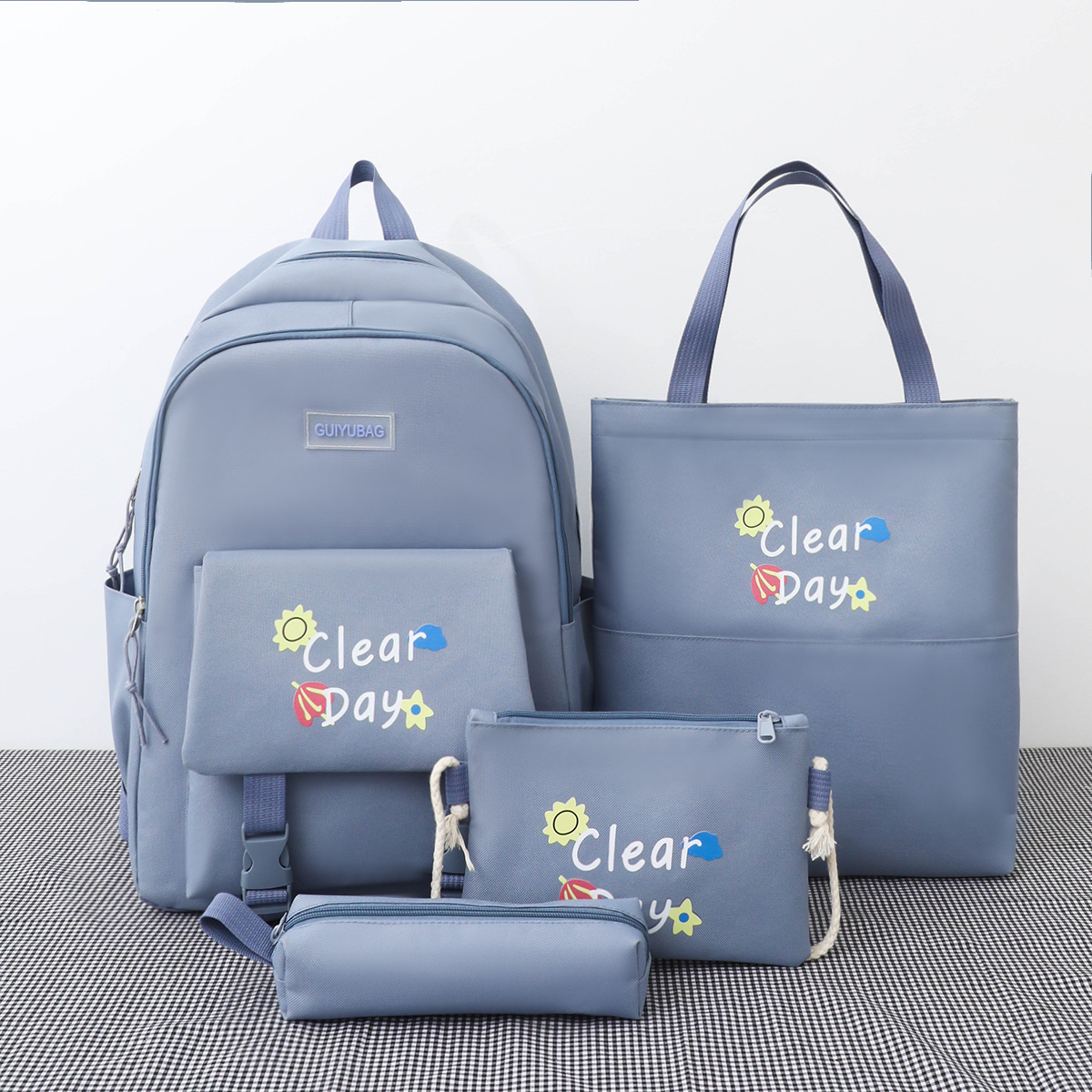 Backpack Four-piece backpack for elementary school students in grades three to six High school tuition bag for high school large capacity books