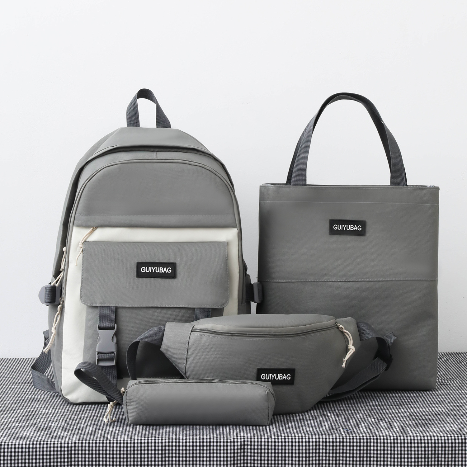 Backpack four-piece set of new school bags for primary school students to supplement the bag for junior high school students backpack for middle school students school children