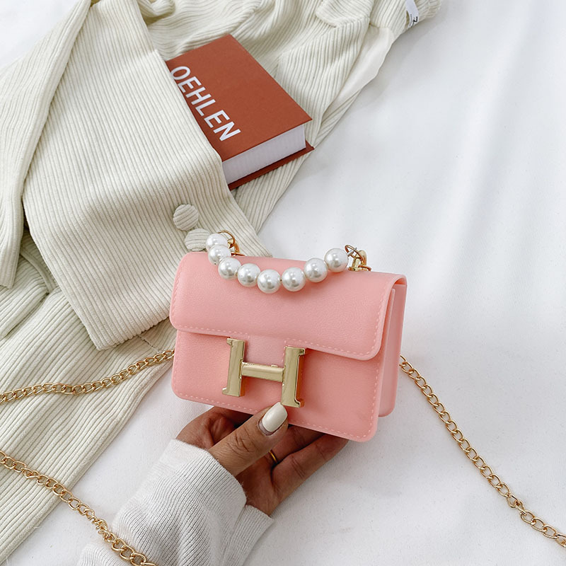 2021 Summer new H-buckle PVC jelly bag, flight attendant bag, Kangkang bag, fashionable single-shoulder crossbody pearl small square bag for women Application Scenario
