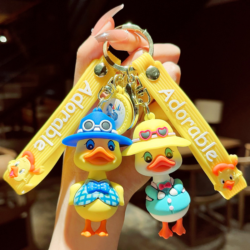New keychain pendants, cute little duck pvc doll accessories, car keychain chains, Yiwu