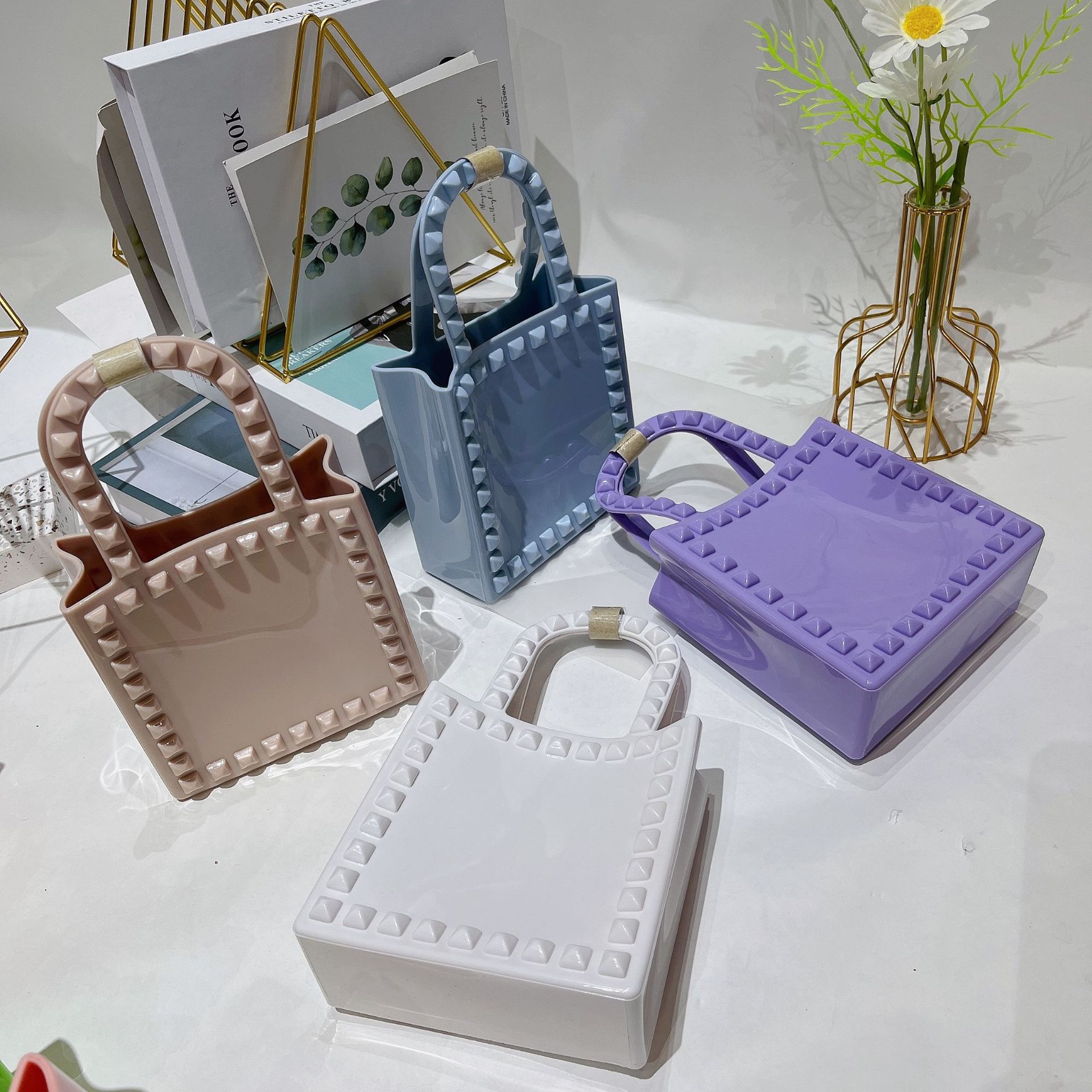 2021 Autumn/Winter cross-border new products: PVC jelly women's Bag, mini fashionable rivet square bag, single-shoulder crossbody wrist bag Application Scenario