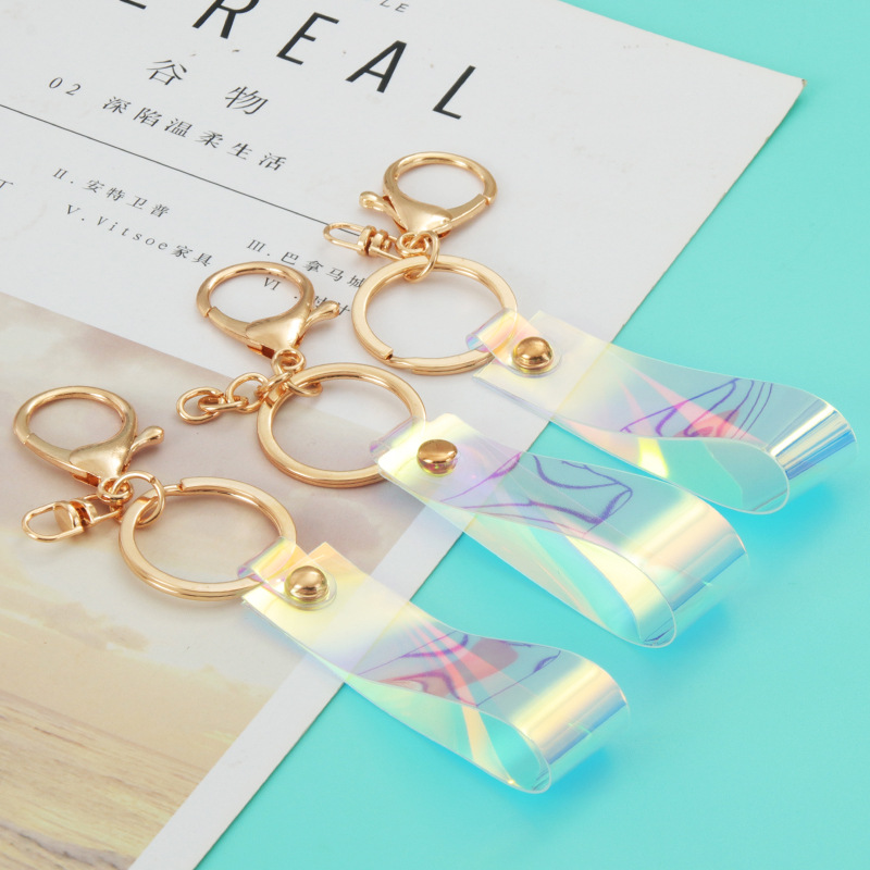 Factory direct laser magic color leather key chain exquisite gifts gifts wholesale car bags creative pendant