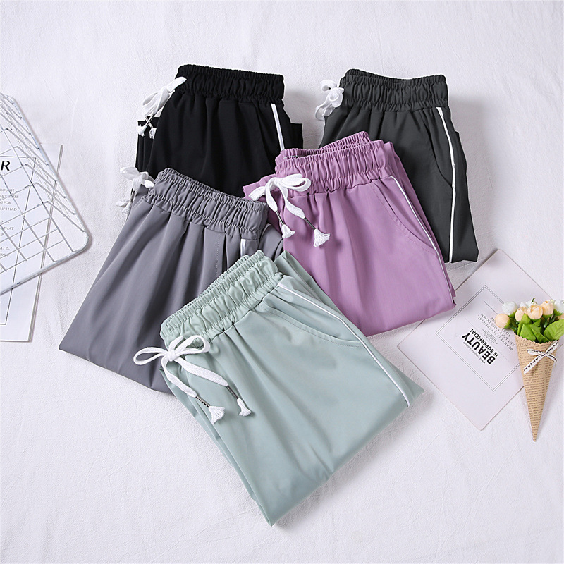 The 2022 new style of Ice Silk quick-drying pants for women's Spring and Autumn is loose, black, tight-fitting, casual, thin grey sportswear pants for summer thinness