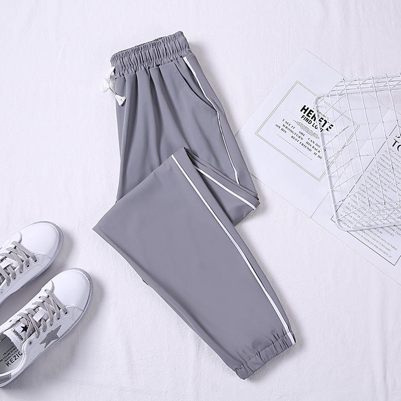 The 2022 new style of Ice Silk quick-drying pants for women's Spring and Autumn is loose, black, tight-fitting, casual, thin grey sportswear pants for summer thinness Specification image