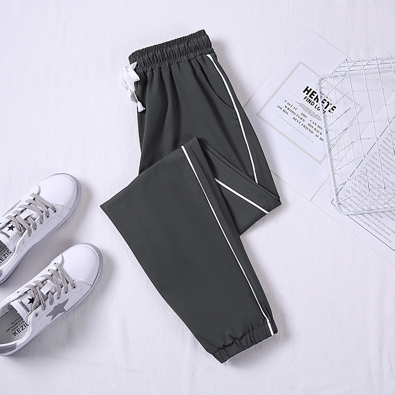 The 2022 new style of Ice Silk quick-drying pants for women's Spring and Autumn is loose, black, tight-fitting, casual, thin grey sportswear pants for summer thinness Application Scenario