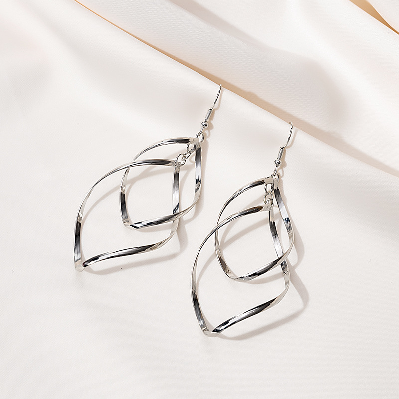 Japan and South Korea department of new metal leaf hollow fashion earpiece long tassel twisted around ear hook earpiece