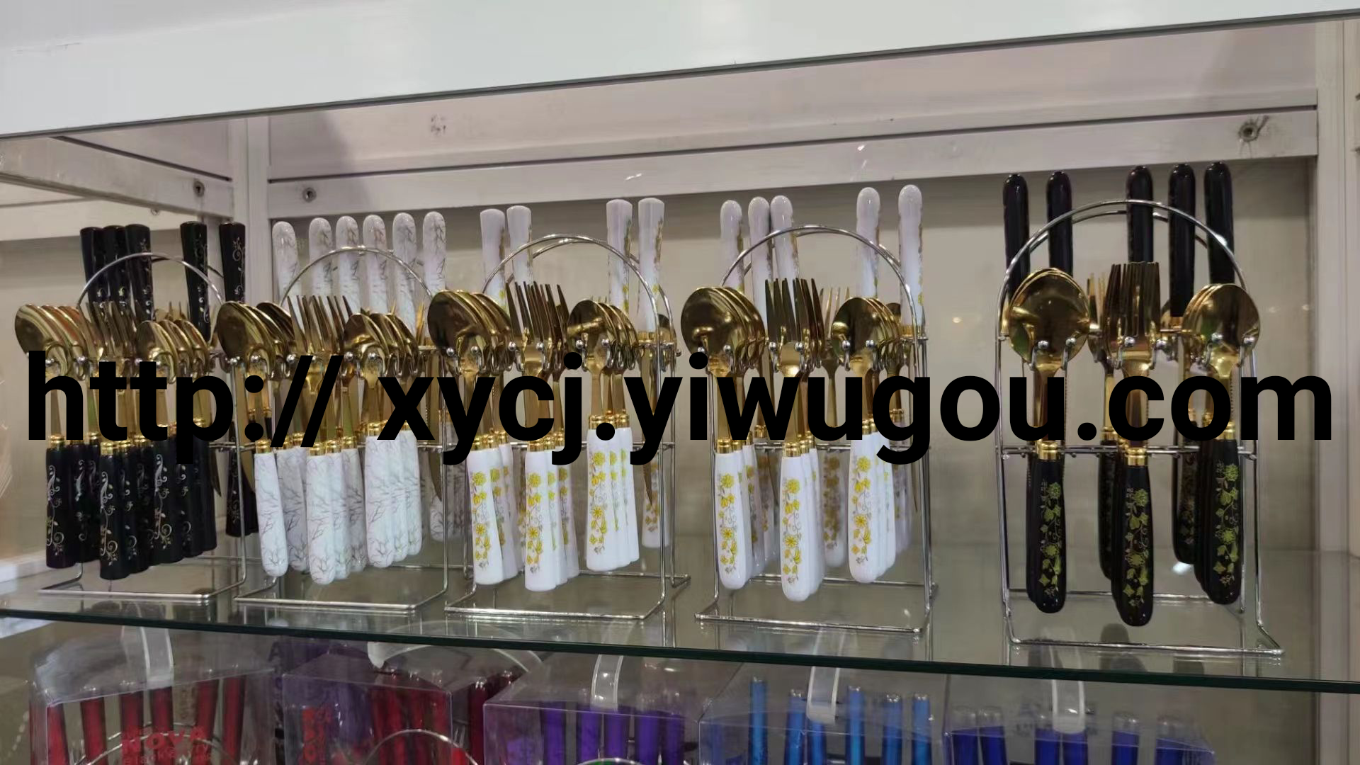 New gold cutlery knife, fork and spoon