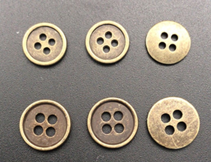 Wholesale of four-hole metal concave seam buttons for fashionable trench coats, down jackets, clothing accessories and buttons from the manufacturer Specification image
