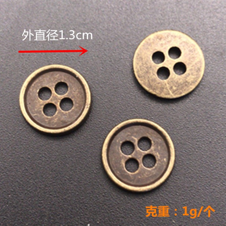 Wholesale of four-hole metal concave seam buttons for fashionable trench coats, down jackets, clothing accessories and buttons from the manufacturer Item Picture