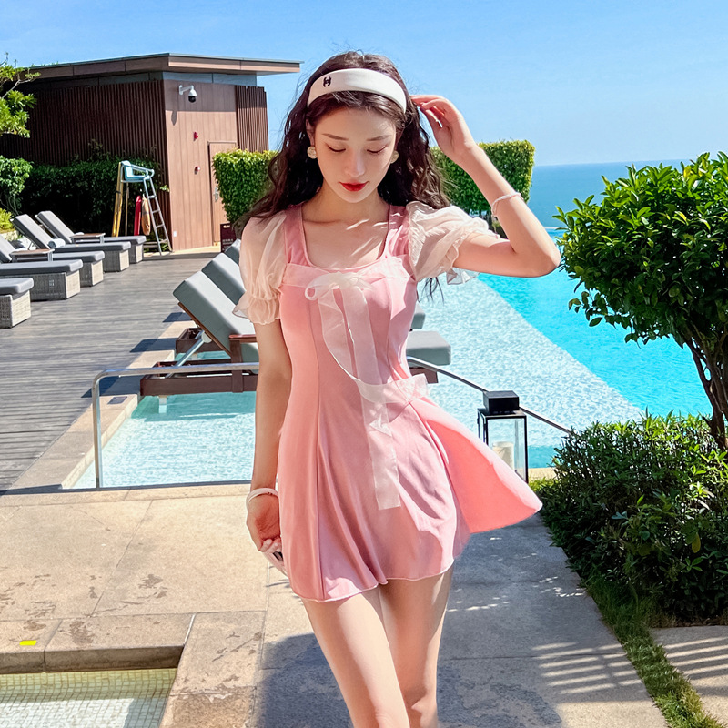 The 2022 new swimsuit in the style of a women's dress with a split, flat Angle, conservative and slimming look, and a forest-like small chest that gathers the Korean ins style Application Scenario