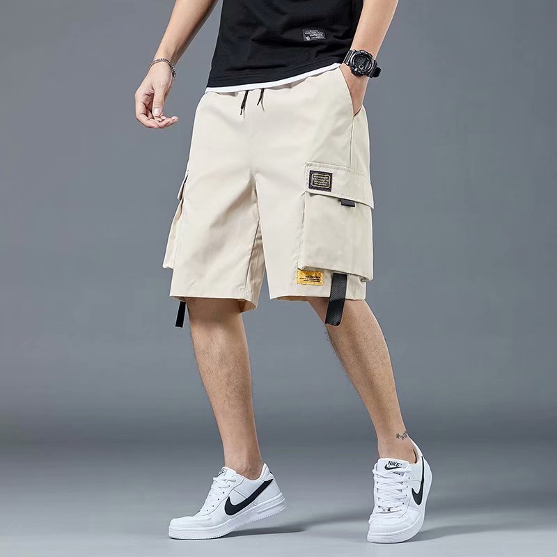 In 2022, men's cross-border large-sized shorts for summer are loose, with a five-point outerwear and seven-point mid-length pants. They are casual workwear and sportswear pants for men Application Scenario
