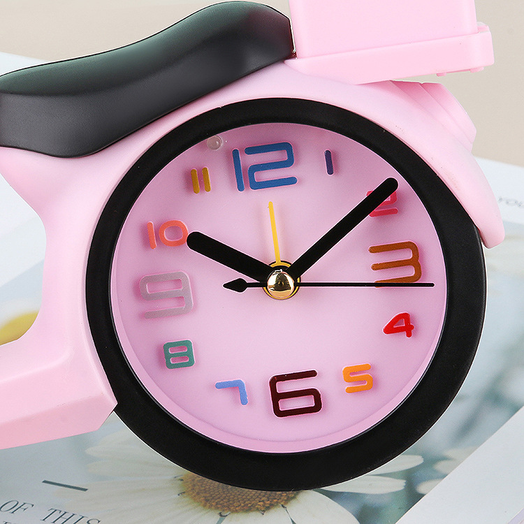 Creative electric vehicle with light alarm clock, student bedside, study, living room clock ornament, children's gift, digital alarm clock Application Scenario